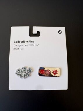 lululemon athletica Silver and Red Collectible Pin Set